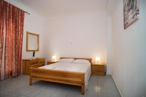 Postel nebo postele na pokoji v ubytování Villa Georgia