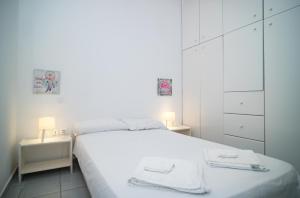 Postel nebo postele na pokoji v ubytování Villa Georgia
