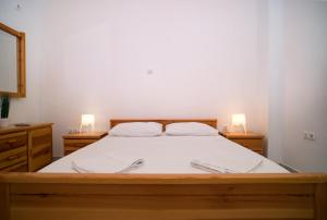 Postel nebo postele na pokoji v ubytování Villa Georgia