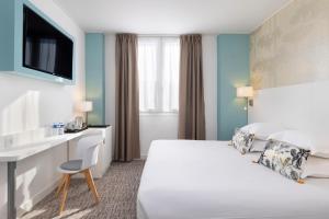 Postel nebo postele na pokoji v ubytování Hôtel Byakko Nice