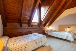 Postel nebo postele na pokoji v ubytování Metsola Apartamentos Rurales