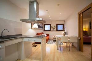 Kuchyň nebo kuchyňský kout v ubytování Metsola Apartamentos Rurales