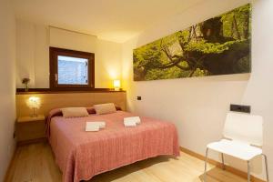 Postel nebo postele na pokoji v ubytování Metsola Apartamentos Rurales