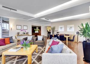 Posezení v ubytování Shanghai Centre Serviced Apartment