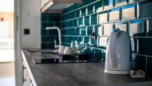 A kitchen or kitchenette at Kalypso studio Resorts