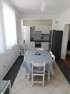 Kuchyň nebo kuchyňský kout v ubytování Apartman G&L