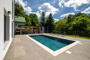 Basen w obiekcie Luxury Villa Rebecca lub w pobliżu