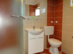 Koupelna v ubytování Apartments Sanja + 26 fotografií