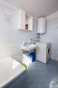Kuchyň nebo kuchyňský kout v ubytování Apartments Dara + 34 fotografií