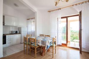 Kuchyň nebo kuchyňský kout v ubytování Apartments Dara