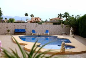 Bazén v ubytování Villa Tres Palmeras en Alfaz del Pi , Albir, Benidorm nebo v jeho okolí