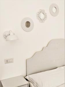 Postel nebo postele na pokoji v ubytování A Polignano Rooms