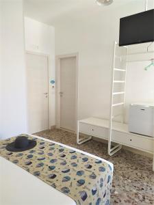 Postel nebo postele na pokoji v ubytování A Polignano Rooms