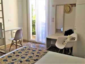Postel nebo postele na pokoji v ubytování A Polignano Rooms