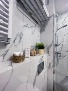 Kúpeľňa v ubytovaní Warsaw Seasons by Alluxe Boutique Apartments