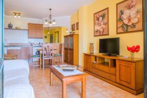 Kuchnia lub aneks kuchenny w obiekcie Bonito apartamento Piscina Wifi