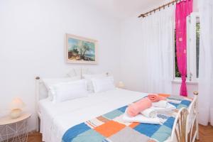 Ein Bett oder Betten in einem Zimmer der Unterkunft Apartments Salis