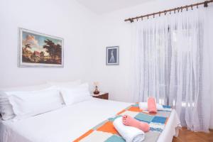 Ein Bett oder Betten in einem Zimmer der Unterkunft Apartments Salis