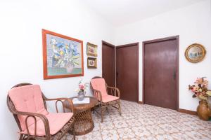 Ein Sitzbereich in der Unterkunft Apartments Salis