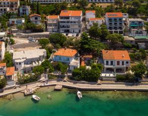 an aerial view of a city with boats in the water at Apartments Lavanda in Neum