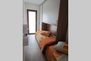 A bed or beds in a room at Apartment - La dolce vita - where dreams come true