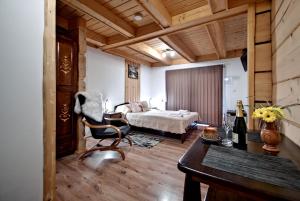 Postel nebo postele na pokoji v ubytování Magnat Inn Sauna & Relax