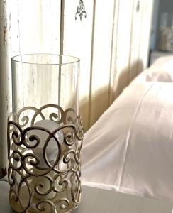 Rúm í herbergi á Enjoy Ledro B&B