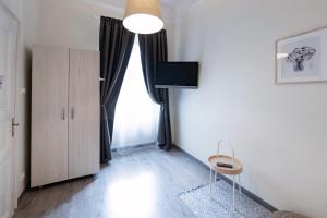 TV a/nebo společenská místnost v ubytování Ozone Private Rooms