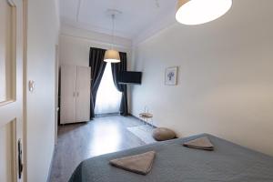 Postel nebo postele na pokoji v ubytování Ozone Private Rooms
