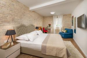 Ένα ή περισσότερα κρεβάτια σε δωμάτιο στο Agava Lux Rooms&Pool