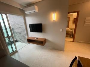 TV a/nebo společenská místnost v ubytování Salinas Exclusive Resort