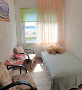 Postel nebo postele na pokoji v ubytování Apartments Josko Barbat