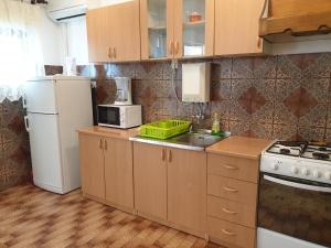 Kuchyň nebo kuchyňský kout v ubytování Apartments Josko Barbat