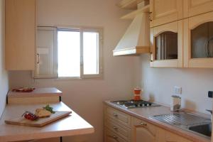A kitchen or kitchenette at Trullo Marianna