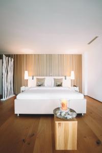 Ліжко або ліжка в номері Hotel AVA