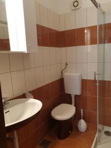 Koupelna v ubytování Apartments Josko Barbat