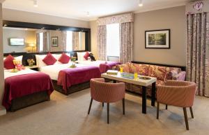 Cama ou camas em um quarto em Ashling Hotel Dublin