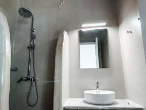 Um banheiro em Fabrica Sunset Apartments