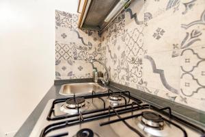 Η κουζίνα ή μικρή κουζίνα στο Stop Colosseo