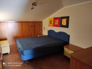 Postel nebo postele na pokoji v ubytování Terrazza sul Mare