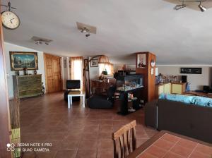 TV a/nebo společenská místnost v ubytování Terrazza sul Mare