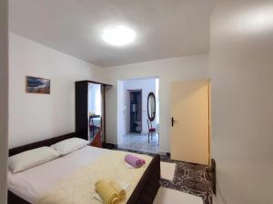 Krevet ili kreveti u jedinici u okviru objekta Apartmani Djedovic -Mara