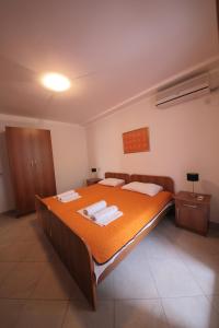 Postel nebo postele na pokoji v ubytování Guest house Zenović