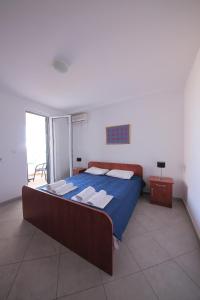 Postel nebo postele na pokoji v ubytování Guest house Zenović + 22 fotografií