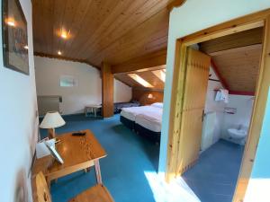 Postel nebo postele na pokoji v ubytování Fedaia Joy B&B + 37 fotografií