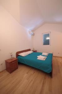 Postel nebo postele na pokoji v ubytování Guest house Zenović