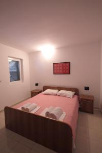 Postel nebo postele na pokoji v ubytování Guest house Zenović