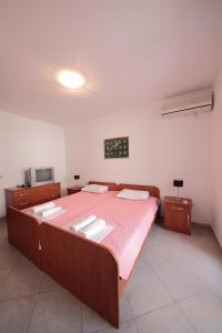 Postel nebo postele na pokoji v ubytování Guest house Zenović