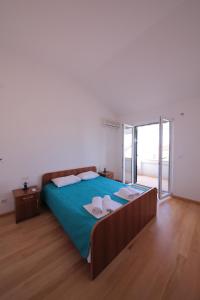Postel nebo postele na pokoji v ubytování Guest house Zenović