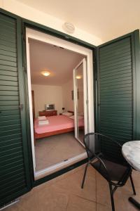Postel nebo postele na pokoji v ubytování Guest house Zenović